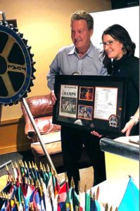 Rotary member Rick Matthias (left) with Michele Schnabel.