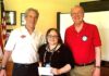 Tualatin Rotary Club Supports Unique Cafe Daniel Lacy (left) accepts Tualatin Rotary Club Legacy Grant from Jessica Cousineau and Mike Bunce.