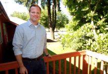 Tualatin Park and Rec asks for your input New City of Tualatin Parks & Recreation Director Ross Hoover stands on the porch of his office building in Tualatin Community Park with the skate park and ball fields in the background. Photo: Barbara Sherman