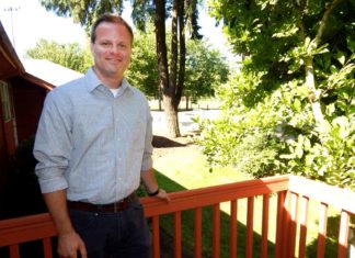Tualatin Park and Rec asks for your input New City of Tualatin Parks & Recreation Director Ross Hoover stands on the porch of his office building in Tualatin Community Park with the skate park and ball fields in the background. Photo: Barbara Sherman