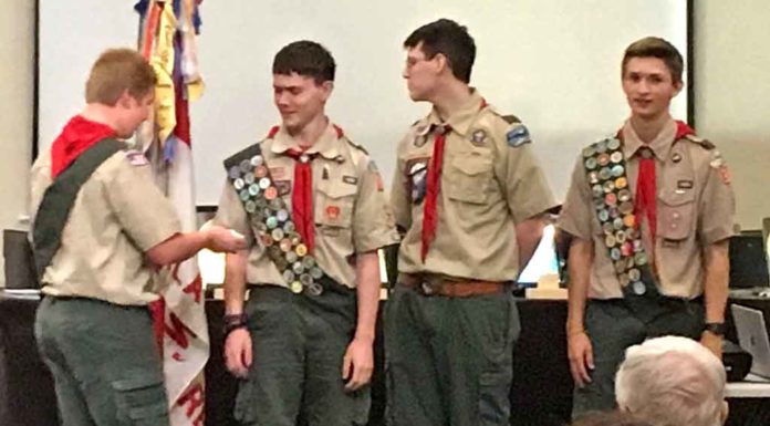 Tualatin BSA Troop 530 Honors a Convocation of Eagle Scouts Mason Lewellan presents three Eagle Scouts earn their Silver Palms (recognition for leadership beyond the Eagle Scout rank): Matthew Dannemiller, Liam Davis, and Devin Boatsman.