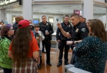 Students ‘Shop with a Cop’ for School Supplies at Fred Meyer
