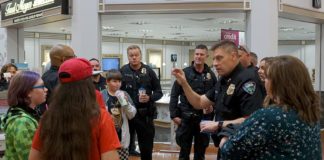 Students ‘Shop with a Cop’ for School Supplies at Fred Meyer