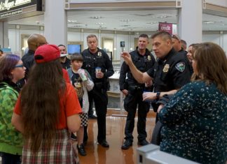 Students ‘Shop with a Cop’ for School Supplies at Fred Meyer