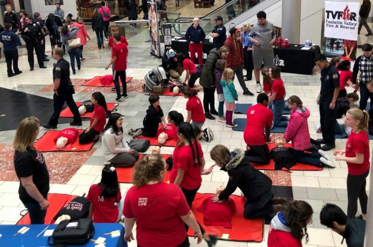 TVF&R, Tigard Police and Valley Catholic teach Hands-Only CPR at Washington Square Mall