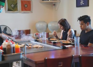 Restaurants Adjust to Life in Phase 1 A couple dines at Izumi’s Japanese Steakhouse during Phase 1.