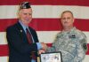 Tualatin VFW Moves to New Location Past Commander Dale Potts accepts certificate from SSG Anthony McDowell.