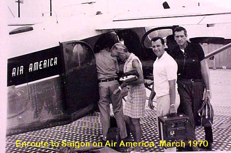 Boarding flight to Saigon to meet with buddy, Sammy Little. The two American civilians are a Doctor and a Nurse with the Volunteer Physicians of Vietnam who work in the Can Tho Provincial Hospital. The man in the khakis is a CIA pilot.
