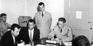 David Dehart spent three years in Turkey as a language interpreter before moving into the third phase in his Army career, as a Special Agent in Counter-Intelligence David, standing, interpreting his first NATO press conference in Turkey. Issue was NATO involvement with US agreement to dismantle missile sites in Turkey and Italy to help defuse Cuban Missile Crisis. Although nuclear-tipped missiles were a national major concern, newspapers the next day seemed more interested in the Turkish Speaking American.