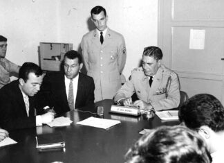 David Dehart spent three years in Turkey as a language interpreter before moving into the third phase in his Army career, as a Special Agent in Counter-Intelligence David, standing, interpreting his first NATO press conference in Turkey. Issue was NATO involvement with US agreement to dismantle missile sites in Turkey and Italy to help defuse Cuban Missile Crisis. Although nuclear-tipped missiles were a national major concern, newspapers the next day seemed more interested in the Turkish Speaking American.