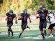 Tualatin football scrapes by in head-to-head with 5A’s finest Senior Malik Ross (8), with aid from AJ Noland (18) and Peter Burke (11), secures an 85-yard touchdown.