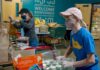 Tualatin Food Pantry fills a vital need in the local community Volunteer Barbara Feist (rear) and her daughter, Davina Barber, unload freshly donated boxes of canned and packaged goods.