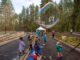 Tualatin CIO President’s Report: December 2021 Children play in the street during a Nov. 20 celebration of the Garden Corner Curves project.
