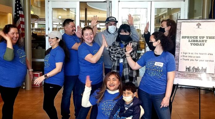 Tualatin Celebrates Our Positively Awesome Volunteers! Volunteers from PGE help “Spruce Up the Library!”
