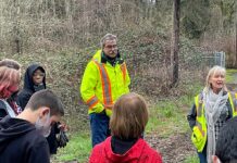Tualatin’s Employee of the Year, Tom Steiger, loves life in the Parks Parks Maintenance Manager Tom Steiger (L) and Parks technician Shelly Helgerson (R) lead Hazelbrook Middle School students through a morning of planting in Jurgens Park