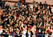 Opinion: Tualatin Basketball State Champions Celebrating the 66-49 State Championship win is the Tualatin Student Section and Cheerleading Squad.