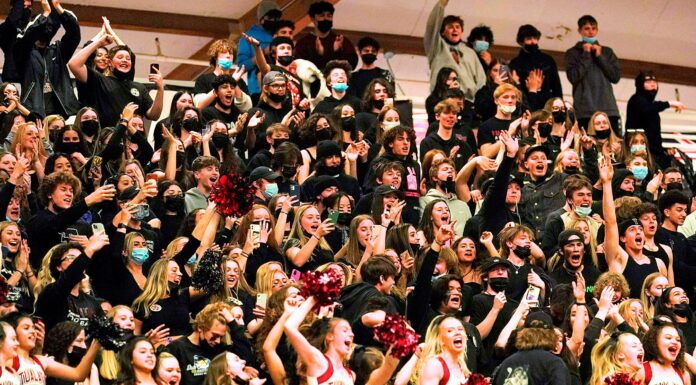 Opinion: Tualatin Basketball State Champions Celebrating the 66-49 State Championship win is the Tualatin Student Section and Cheerleading Squad.