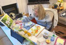 WOW! Local art group Wild Over Watercolor! still going strong Wild Over Watercolor member Karen Berg working on a painting at a WOW! meeting.