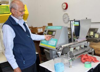 Tualatin company helps make the snacks that everyone loves At his Tualatin business, Gulzar Ahmed demonstrates how products are moved along a vibrating conveyer belt.