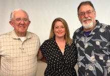 Rotarians: United by Service Left to right: Rotarians Walt Emery, Julie Yarnall and Mark Derry.