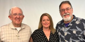Rotarians: United by Service Left to right: Rotarians Walt Emery, Julie Yarnall and Mark Derry.