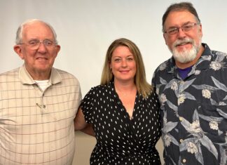 Rotarians: United by Service Left to right: Rotarians Walt Emery, Julie Yarnall and Mark Derry.