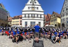 Tualatin High School musician plays his way through Europe on summer adventure The Oregon Ambassadors of Music, a band comprised of high school students and recent graduates from around the state, plays a concert in the walled, medieval city of Rottenburg, Germany.