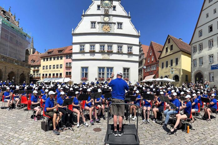 The Oregon Ambassadors of Music, a band comprised of high school students and recent graduates from around the state, plays a concert in the walled, medieval city of Rottenburg, Germany.