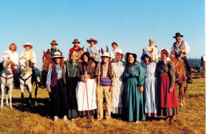 Barb Stinger (fourth from left) gathers with her friends as they prepare to walk the final seven miles of the Oregon Trail. 