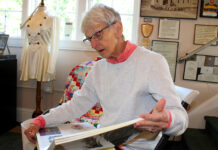 Modern-day pioneer walks in footsteps of great-great-great-grandparents on Oregon Trail At the Heritage Center, Barb Stinger looks through her scrapbook filled with photos, newspaper articles and mementos from her 1993 walk along the Oregon Trail.