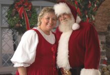 Playing the Clauses is a family affair for close-knit Caffall brothers Tami and Rick Caffall, all dressed up and ready for the wish lists.