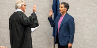 Octavio Gonzalez is only new member on City Council Tualatin Municipal Court Judge Jack Morris (left) swears in Octavio Gonzalez at the Jan. 5 City Council meeting.