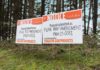 Tualatin Annexes One-acre Norwood Road Parcel from Washington County A pair of public notices stand on the property located at the intersection of SW Boones Ferry and SW Norwood Roads.