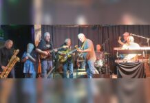 A Gathering of Friends at the CI Bar & Grill From Left, Pete Moss on sax, George Discant on harmonica, guitarists Ken Scandlyn, Rouke Vanderveen, and Gary Hines, Jimi Bott on drums, Jim Solberg on bass and Ed Neumann on keyboards.