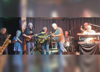 A Gathering of Friends at the CI Bar & Grill From Left, Pete Moss on sax, George Discant on harmonica, guitarists Ken Scandlyn, Rouke Vanderveen, and Gary Hines, Jimi Bott on drums, Jim Solberg on bass and Ed Neumann on keyboards.