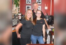 At Gambino’s Italian Cafe, everyone is family Janelle and Chris Johnson stand behind the bar with her daughter Abby Inkens, who works at the King City restaurant full time.