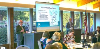 Transportation: Pay More, Get Less? Washington County Commissioner Roy Rogers (left) and Clackamas County Commissioner Paul Savas (top right) discuss the plans and cons of a proposed I-205 tolling plan at last year’s Tualatin Chamber of Commerce Key Leaders Breakfast. File Photo/Tualatin Life