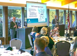 Transportation: Pay More, Get Less? Washington County Commissioner Roy Rogers (left) and Clackamas County Commissioner Paul Savas (top right) discuss the plans and cons of a proposed I-205 tolling plan at last year’s Tualatin Chamber of Commerce Key Leaders Breakfast. File Photo/Tualatin Life