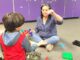 TTSD Makes Big Changes in Autism Services In this photo, Autism Specialist Val Valo uses play-based strategy to support the student’s social and language development. She encourage him to ask for the marbles in her hand as he builds a marble tower.