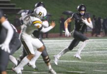 Tualatin cruises to first-round playoff win After filling in at quarterback for six games due to an injury, Tualatin's AJ Noland was back at receiver Friday night, and hauled in two touchdowns in a 49-3 win.