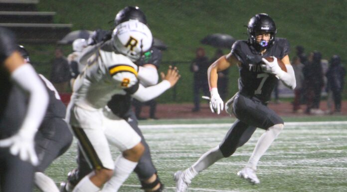 Tualatin cruises to first-round playoff win After filling in at quarterback for six games due to an injury, Tualatin's AJ Noland was back at receiver Friday night, and hauled in two touchdowns in a 49-3 win.