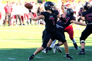 Tualatin senior AJ Noland once again found himself playing quarterback in the state title game, as injuries to a few key players put Tualatin in a hole.