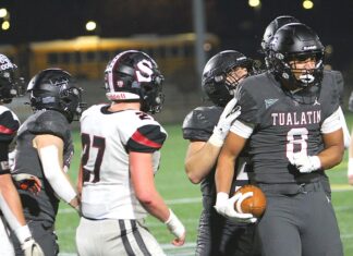 Three Tualatin football players sign on to play collegiately