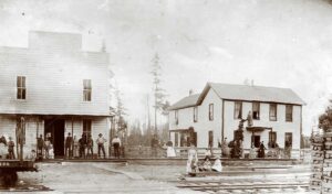 J.R.C. Thompson’s general store, around 1895, where the Grange met upstairs. To the right is Thompson’s home. The store and home were just south of the Southern Pacific Railroad.