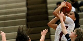 Tualatin girls basketball cruises to win to open playoffs