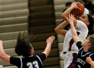 Tualatin girls basketball cruises to win to open playoffs