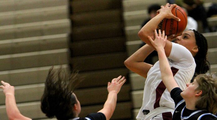 Tualatin girls basketball cruises to win to open playoffs