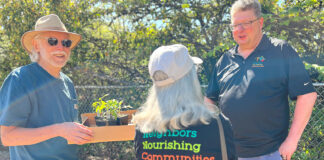 Growing Fresh Healthy Food – For You and the Community Gardeners picking up plants at the annual handout, and chatting with Mayor Frank Bubenik.