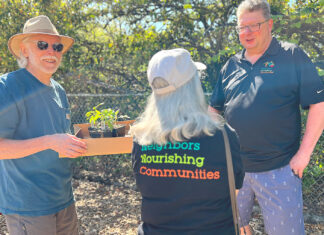 Growing Fresh Healthy Food – For You and the Community Gardeners picking up plants at the annual handout, and chatting with Mayor Frank Bubenik.