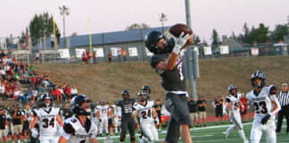 Tualatin football following lead of sophomore running back heading into league play